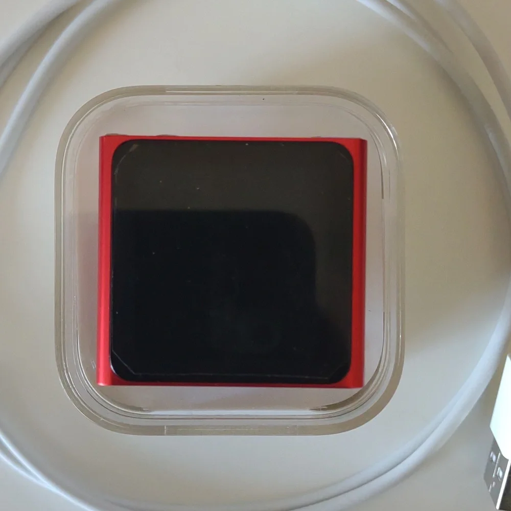 Apple iPod Nano Touch Special Edition RED with watch band.